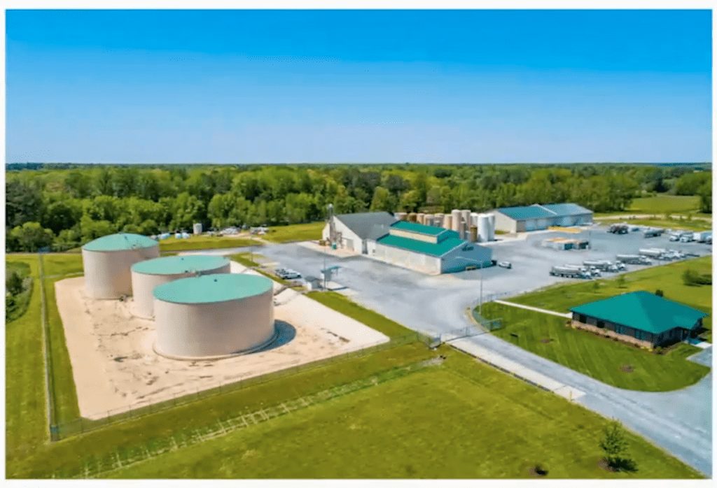 Plant nutrient facility in Greenwood, Delaware surrounded by green grass and blue skies